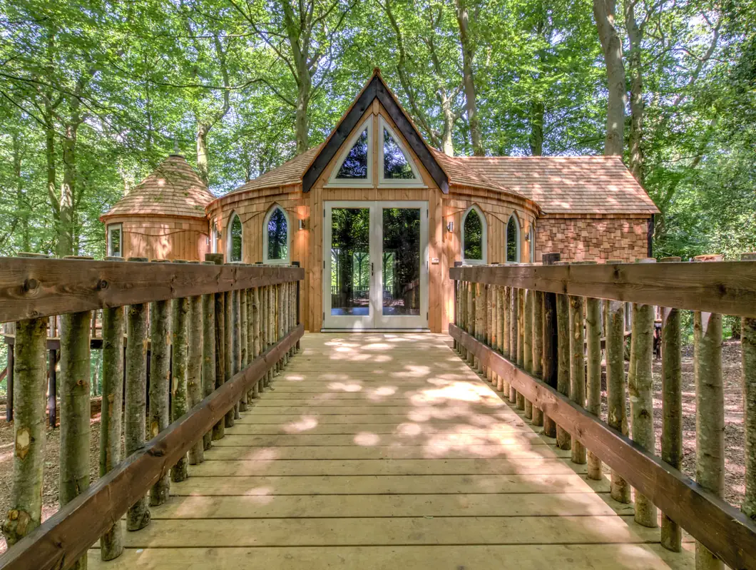 The rope bridge crossing to Cedar Hollow Treehouse