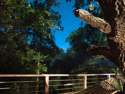 The outdoor shower under a starry night sky