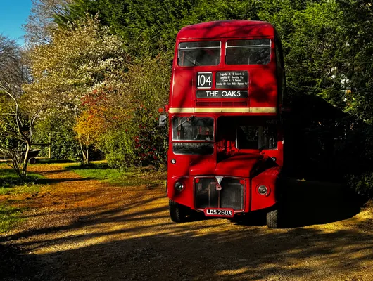 The Routemaster bus on the C.S. Lewis Trail through the Oxford woodland