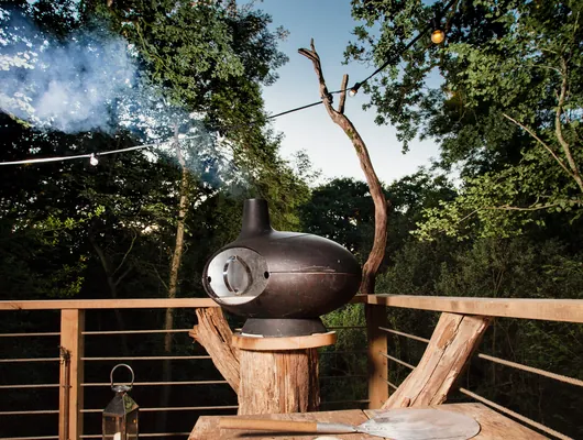 Dough and tools at the wood-fired pizza oven