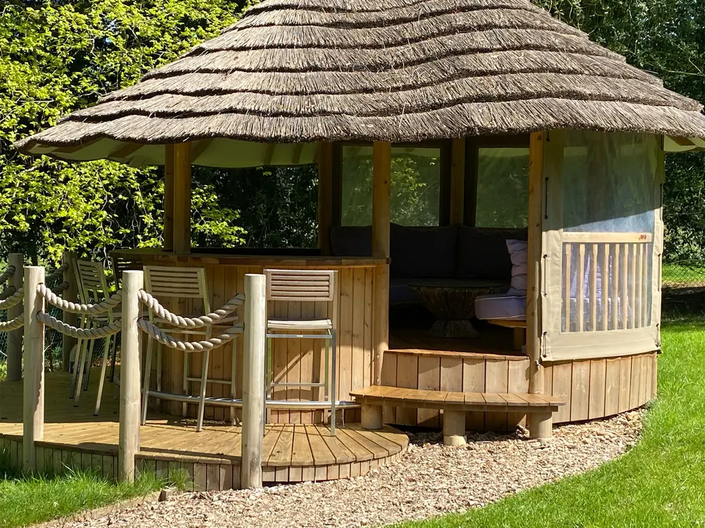 The honesty bar and outdoor cinema at Cedar Hollow Oxford, 1 of 3