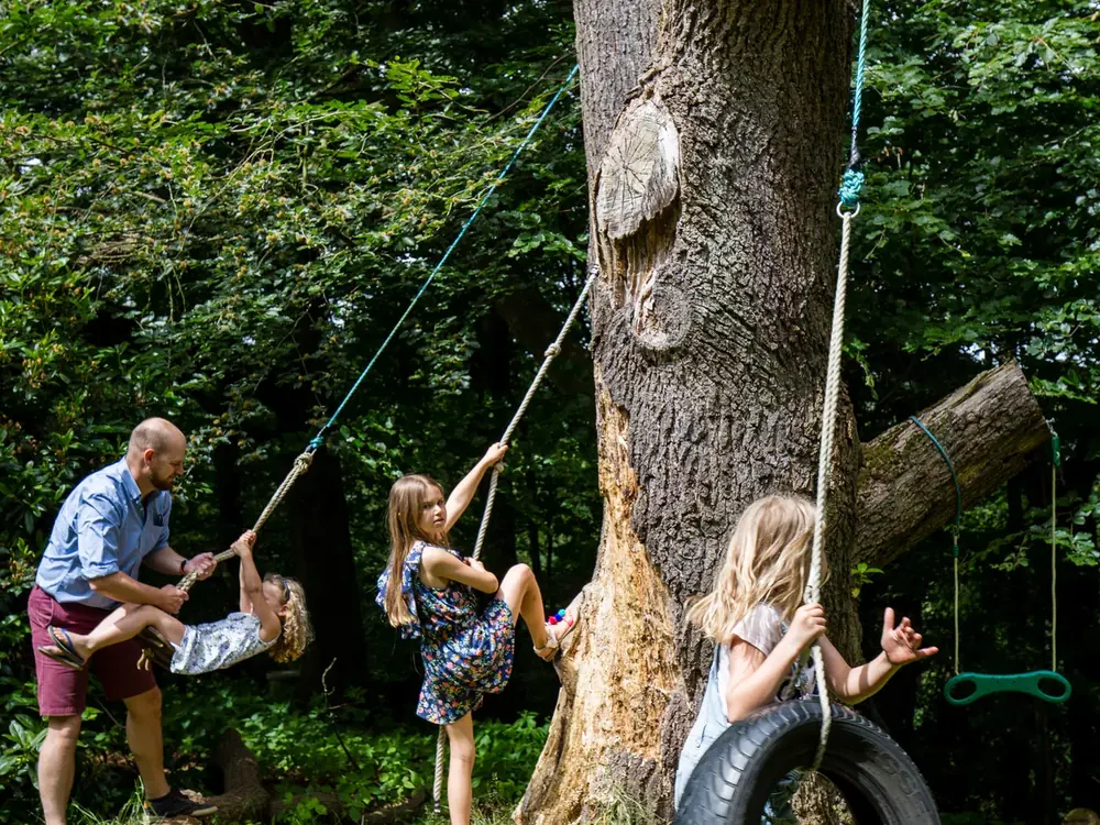 The trampoline, slackline, swings and zipline at Cedar Hollow Oxford, 8 of 10